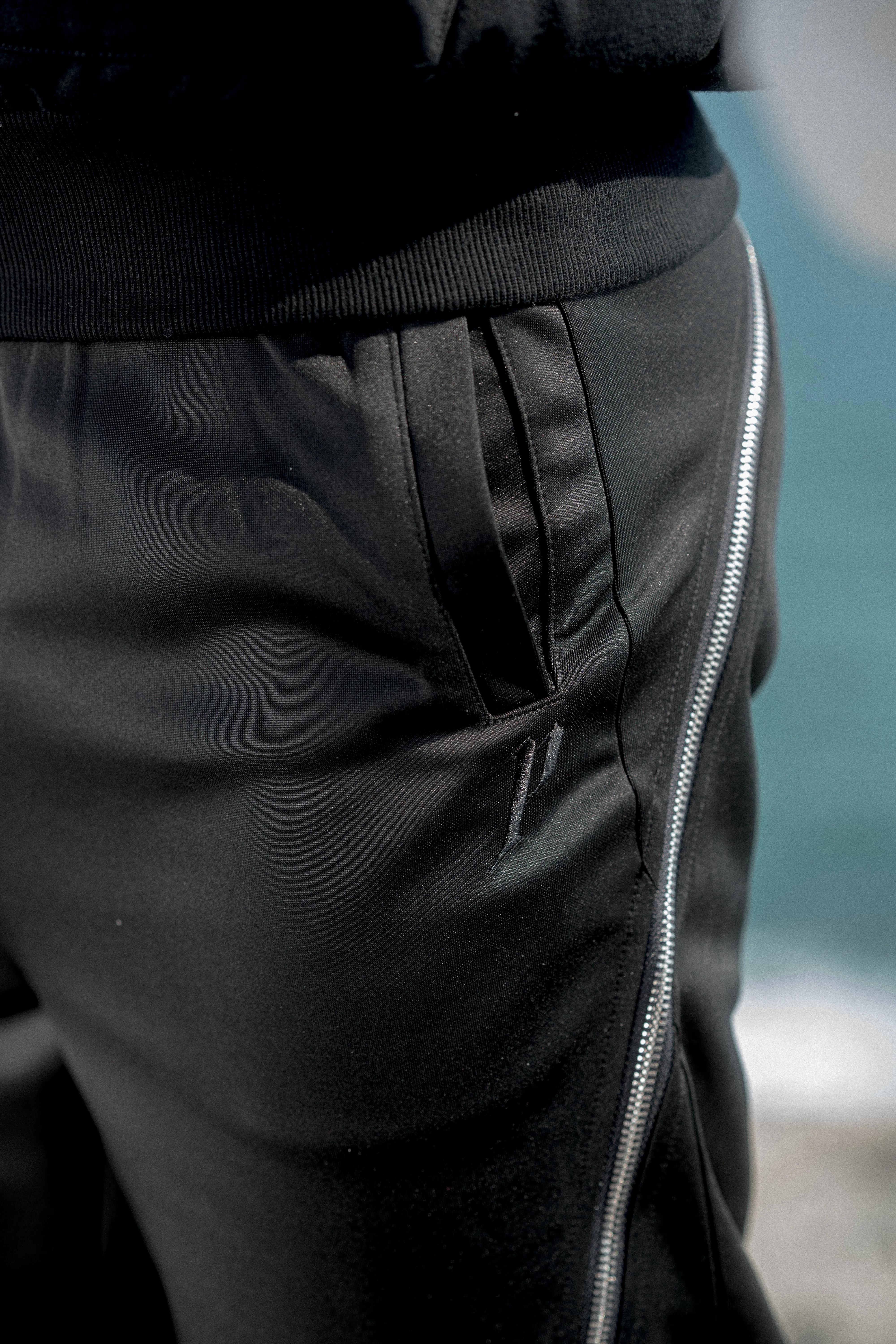 HYBRID ZIP FLARE TROUSERS