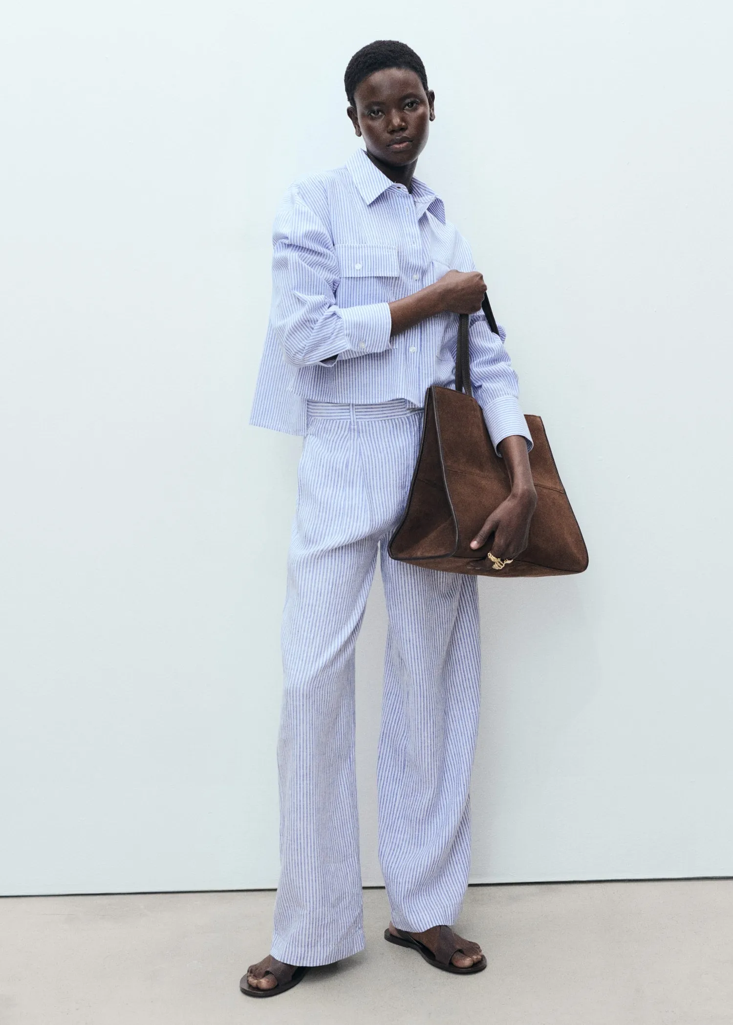 Striped linen-blend trousers