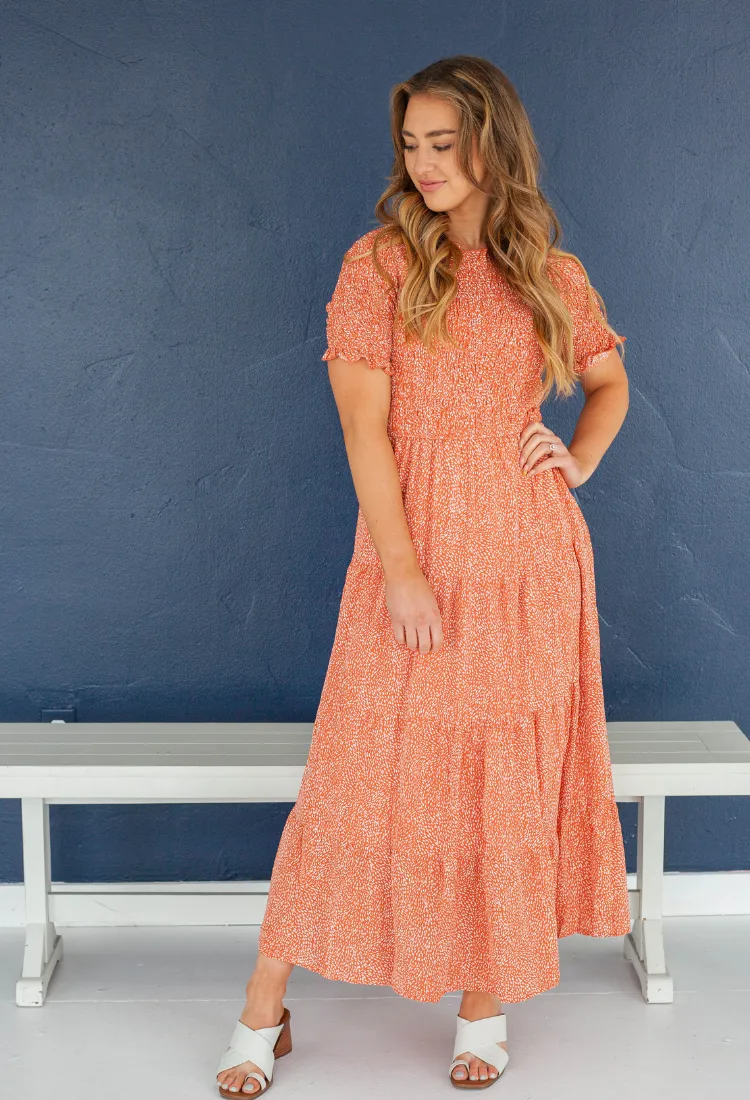 Tersa Smocked Dress in Rustic Coral