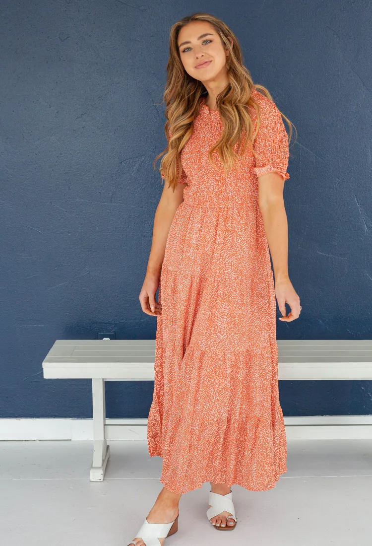 Tersa Smocked Dress in Rustic Coral
